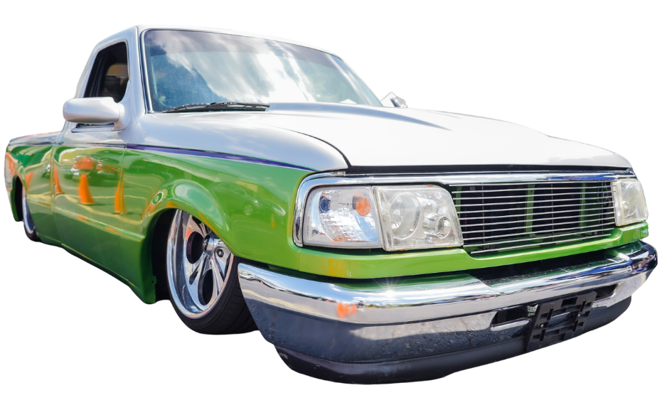 Custom lowered green and silver pickup truck